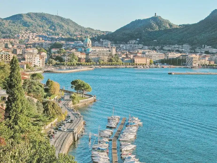 The Como lungolago, the cathedral dome and the harbour seen from the hillside above the lake
