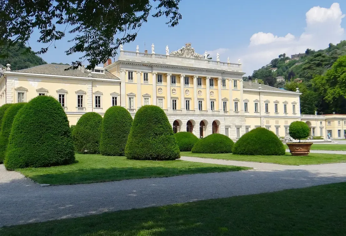 Topiary bushes on the lawn in front of Villa Olmo in Como