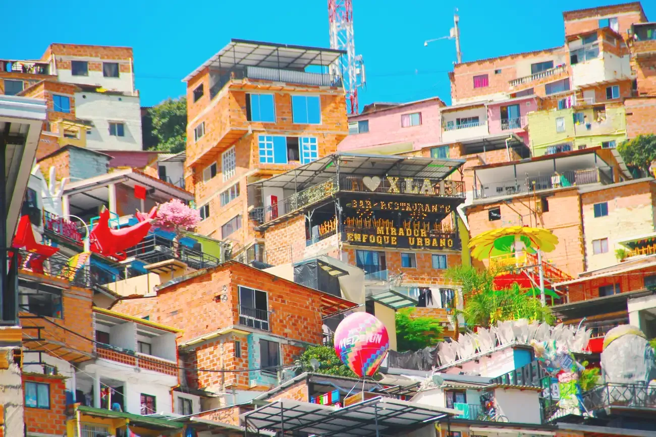 Colourful painted houses and street art on the Comuna 13 hillside, Medellin, Colombia