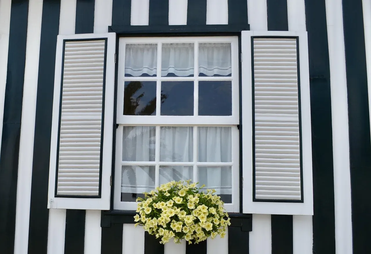 A striped wooden palheiro house at Costa Nova near Aveiro