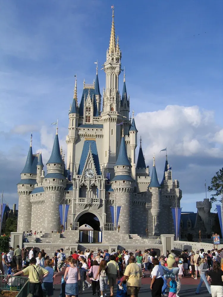 Crowds on the plaza in front of Cinderella Castle at Walt Disney World near Orlando