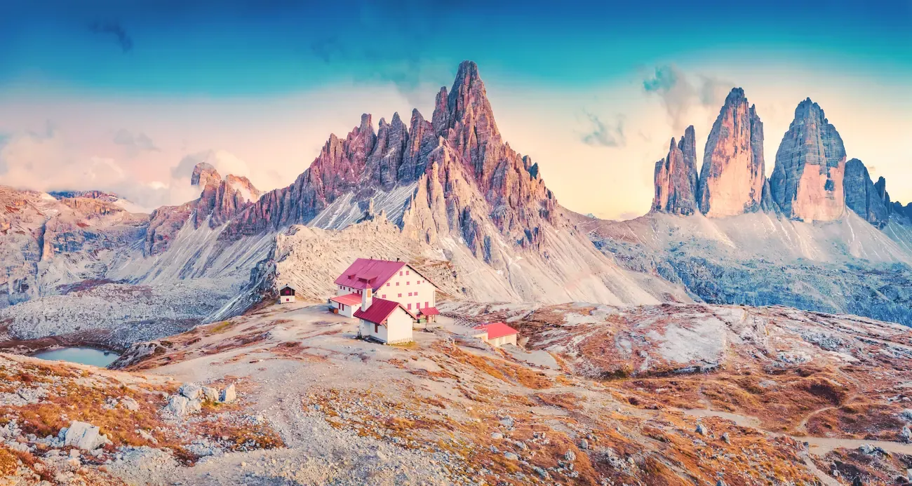 The three peaks of Tre Cime di Lavaredo at sunrise in the Dolomites, Italy