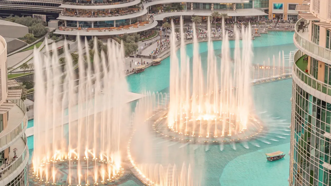 The Dubai Fountain water show at sunset