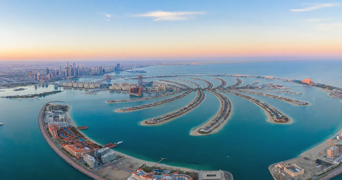Aerial view of the Palm Jumeirah island and Dubai skyline