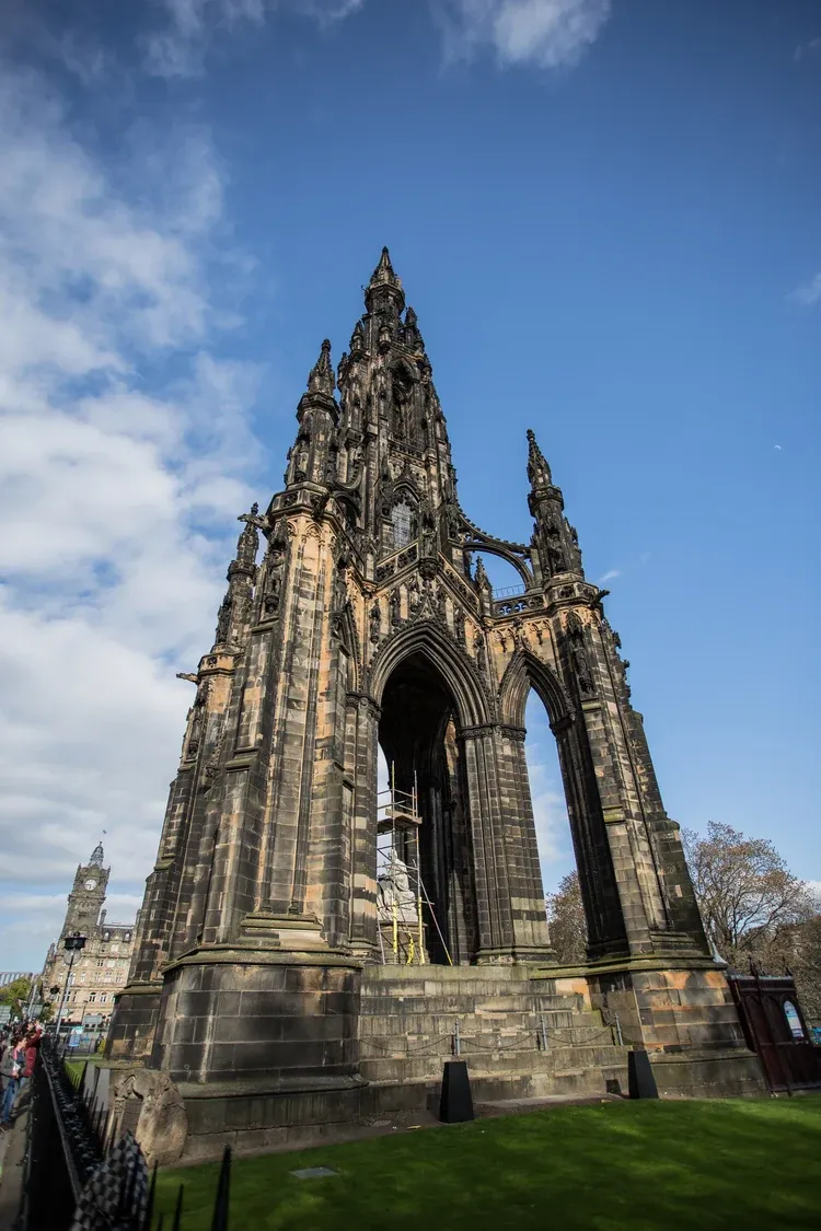 The Gothic spire of the Scott Monument rising over Princes Street in Edinburgh
