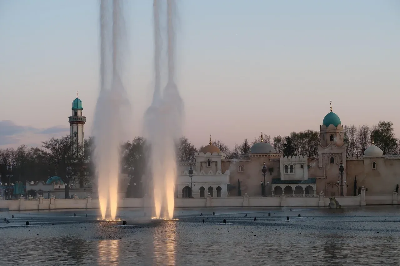 The Aquanura water fountains playing in front of the Fata Morgana palace at Efteling in Kaatsheuvel