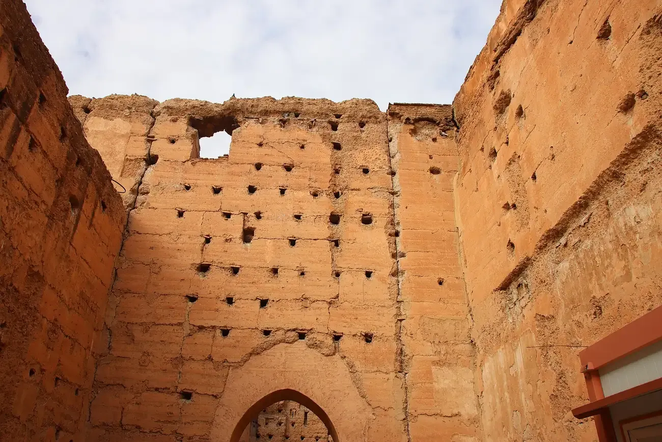 The ruined earthen walls of the El Badi Palace where storks nest in Marrakech
