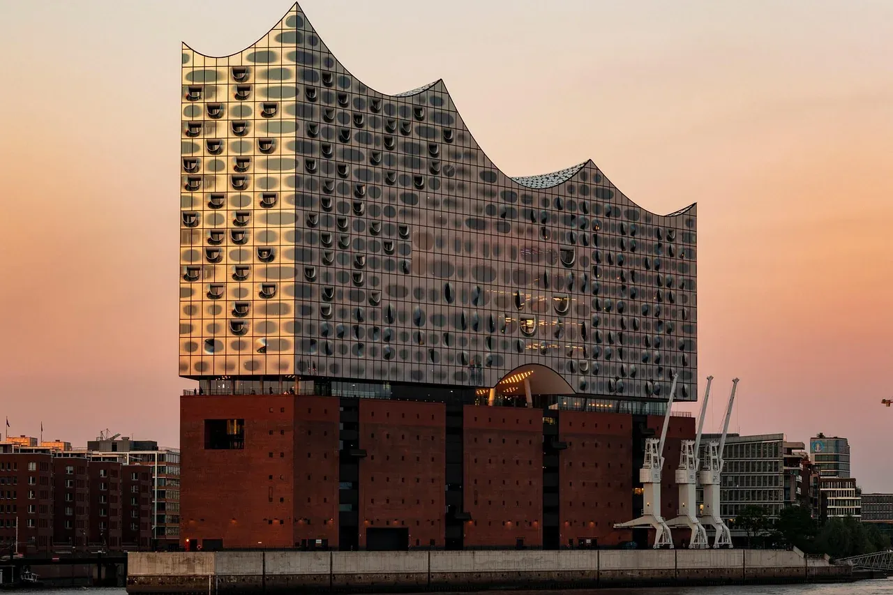 The Elbphilharmonie at sunset seen across the Elbe in Hamburg