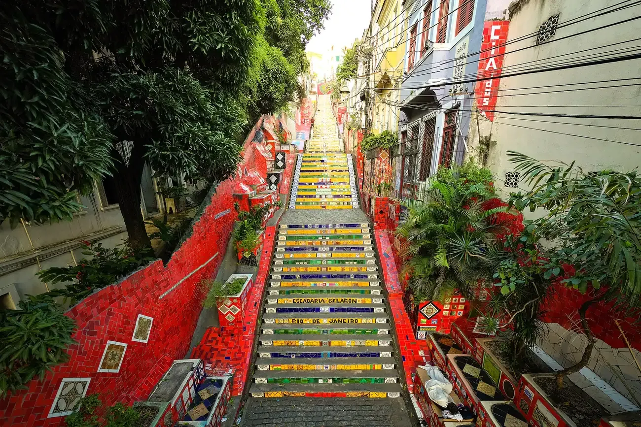 The Escadaria Selaron climbing between houses towards Santa Teresa