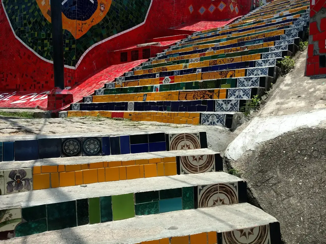 Blue, green and yellow tiles covering the Escadaria Selaron in Rio de Janeiro