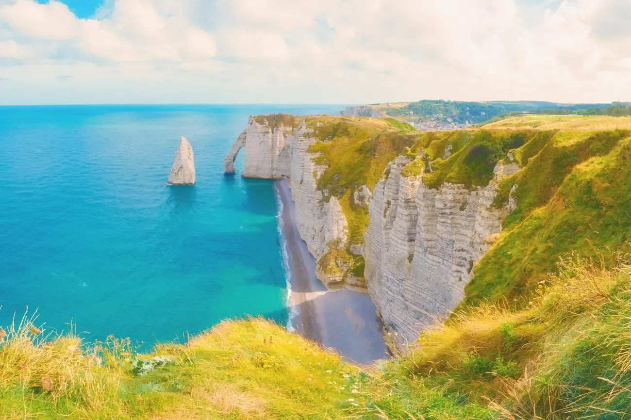 Etretat's white chalk cliffs and natural sea arch, Normandy, France