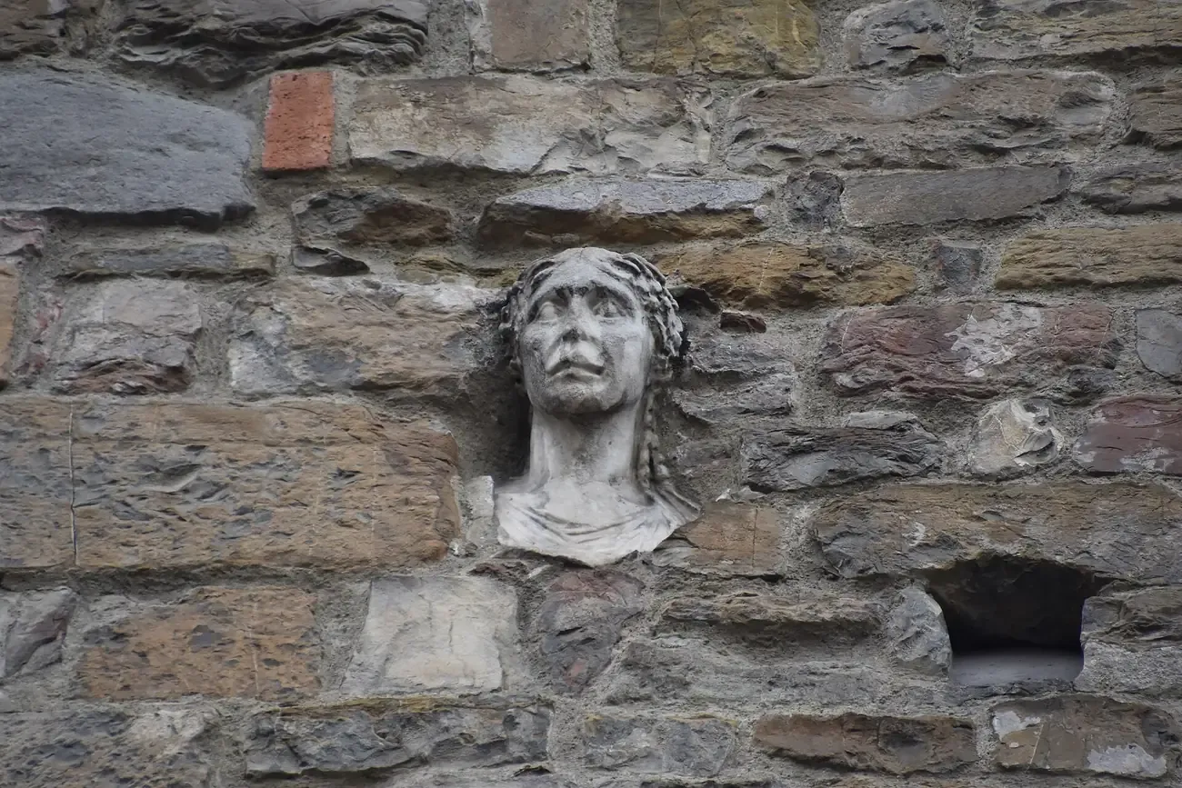 La Berta, the carved stone head set into the wall of Santa Maria Maggiore in Florence