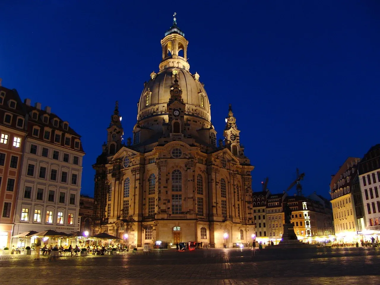 The Frauenkirche lit above the Neumarkt at blue hour in Dresden