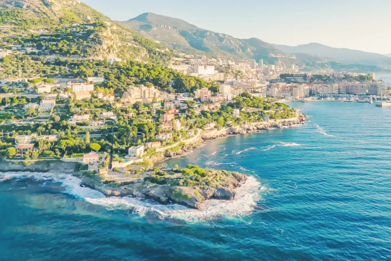 The French Riviera coastline seen from the air, villas and gardens above the Mediterranean