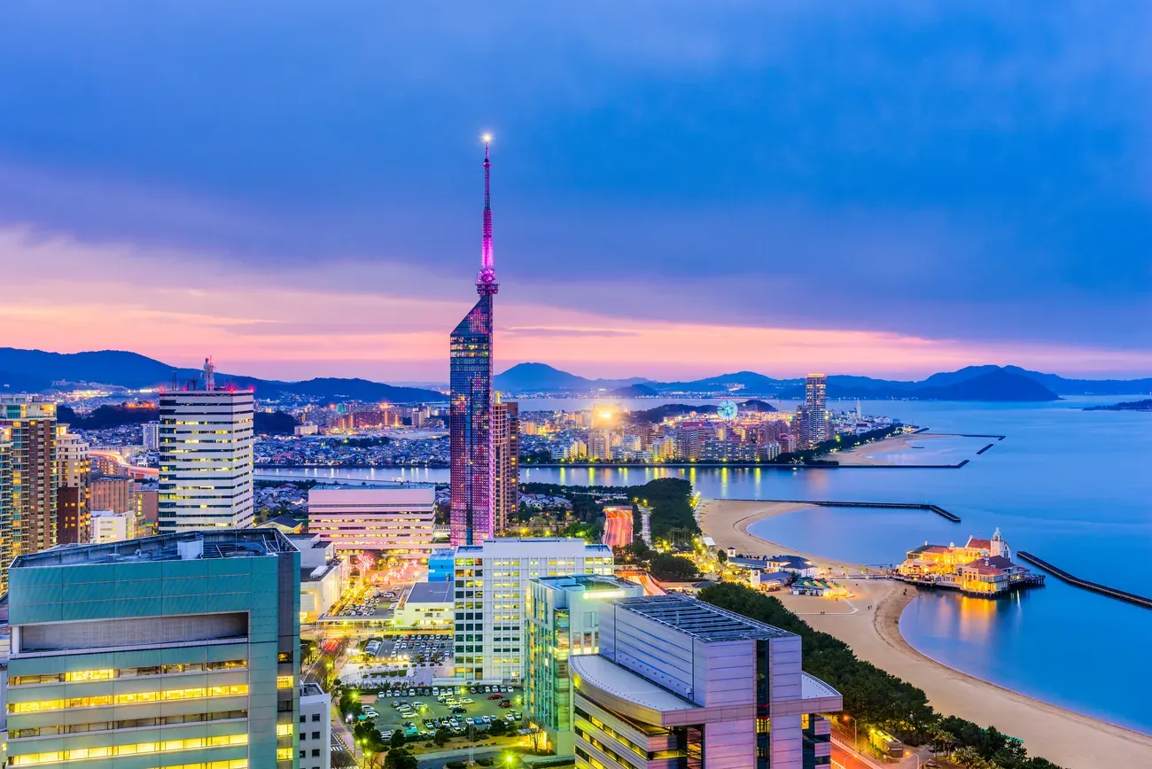 Fukuoka Tower above the Momochi seaside at dusk