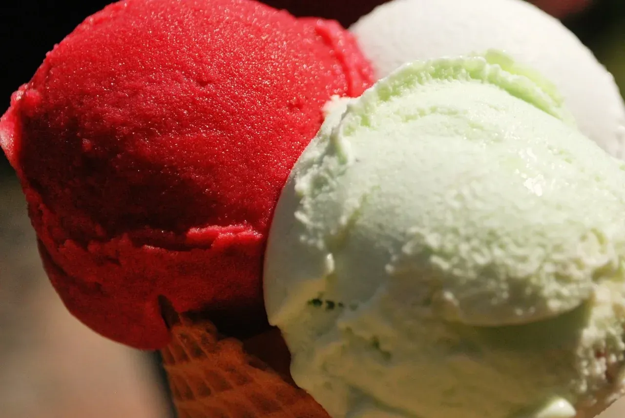 Gelato cone with three scoops from an Italian gelateria