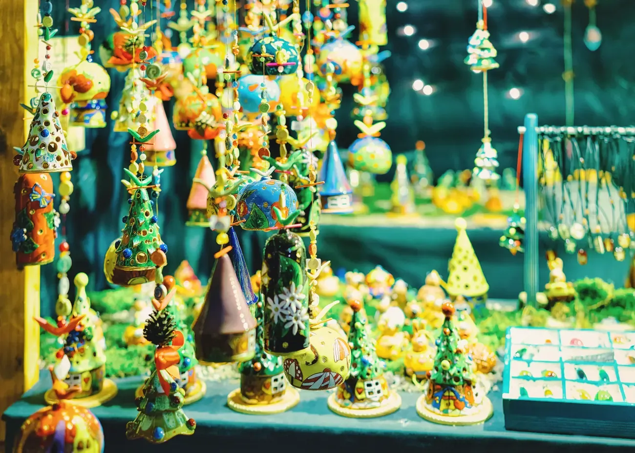 Glass Christmas tree ornaments hanging at a stall of the Gendarmenmarkt Christmas market in Berlin