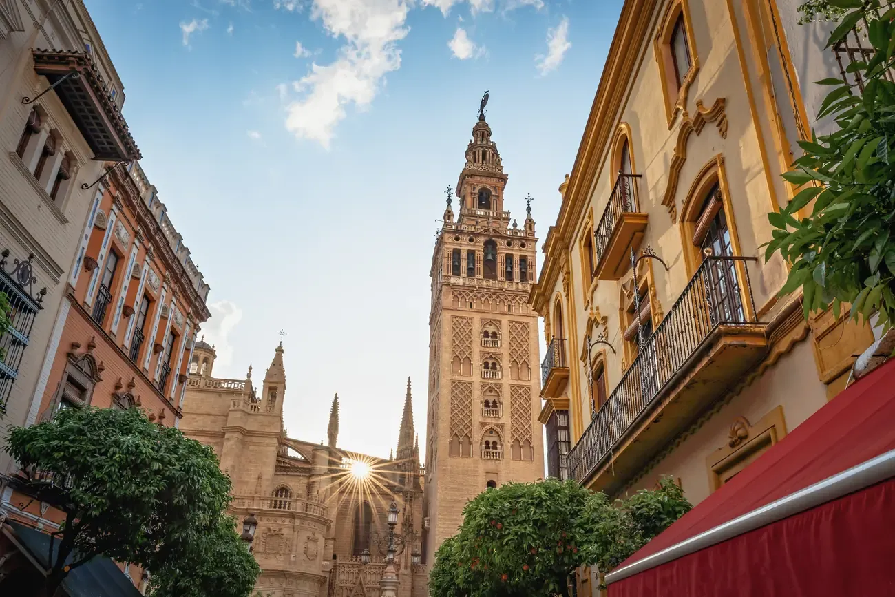 The Giralda bell tower seen from a Seville street