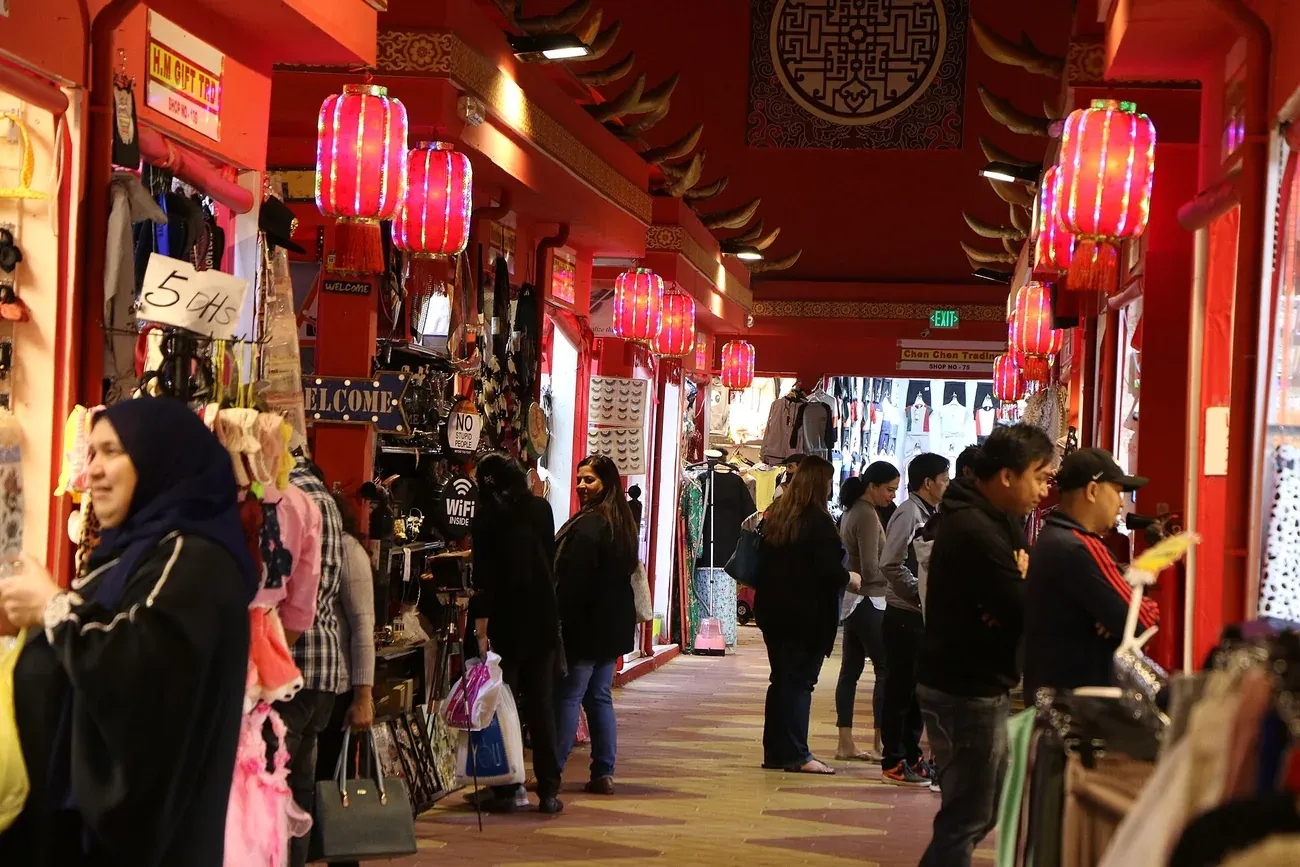 A pavilion street hung with lanterns at Global Village in Dubai