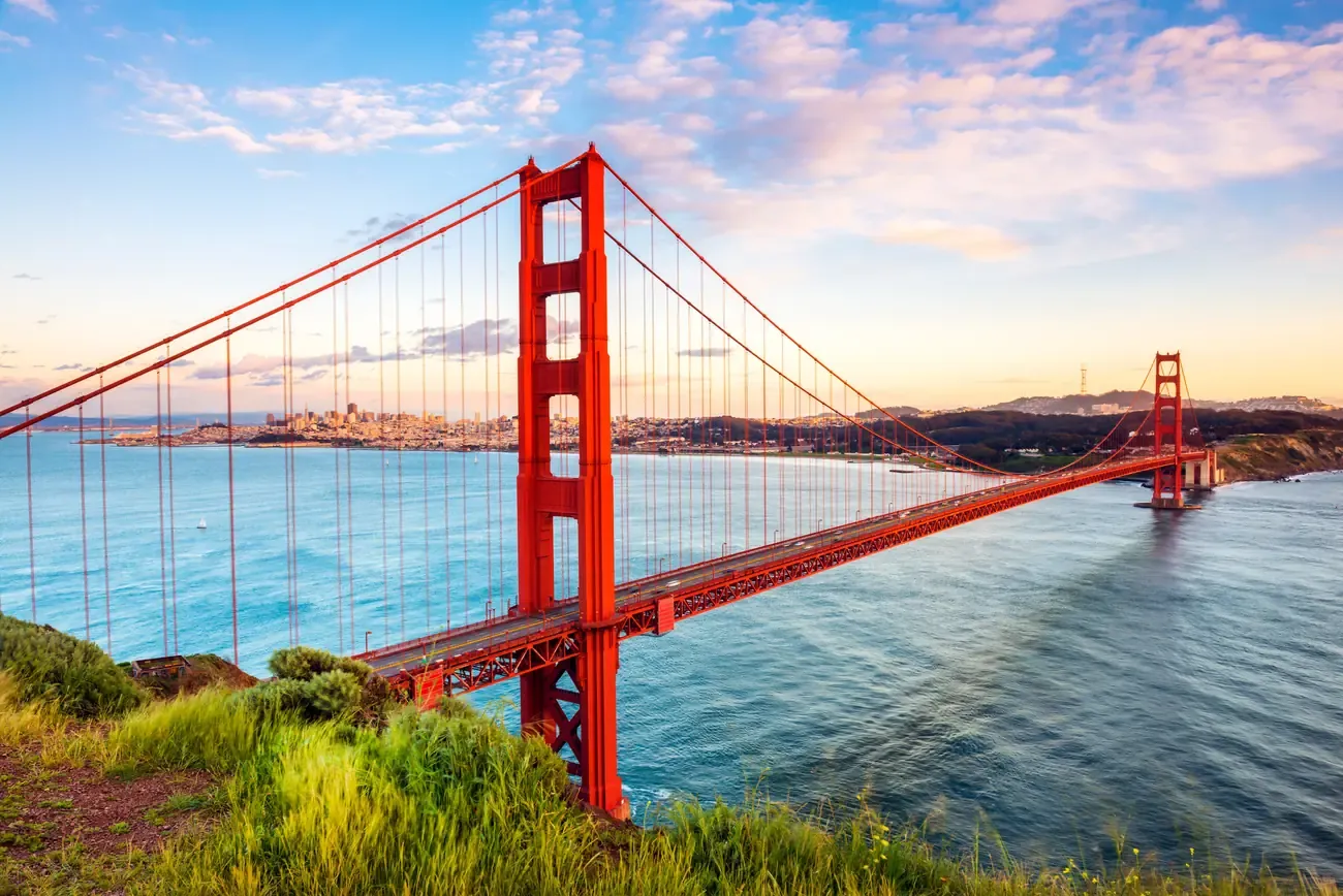 The Golden Gate Bridge spanning the strait with San Francisco on the far shore