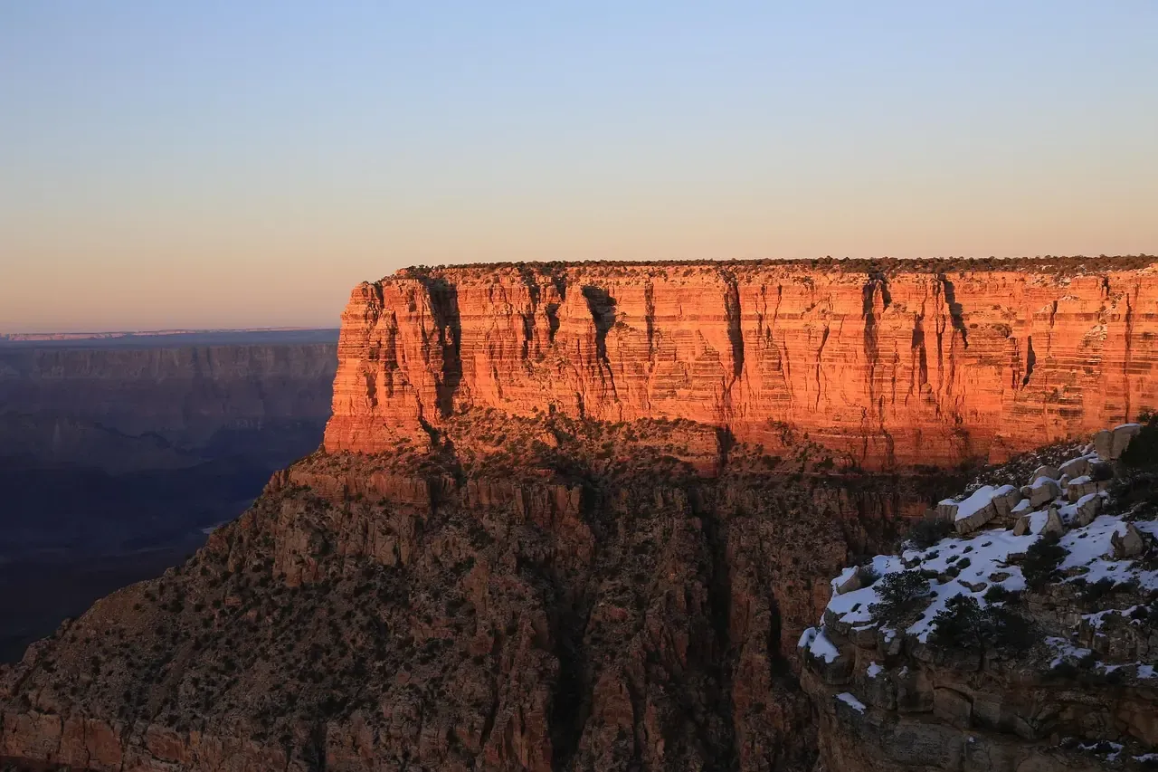 The layered rock walls of the Grand Canyon gorge in Arizona