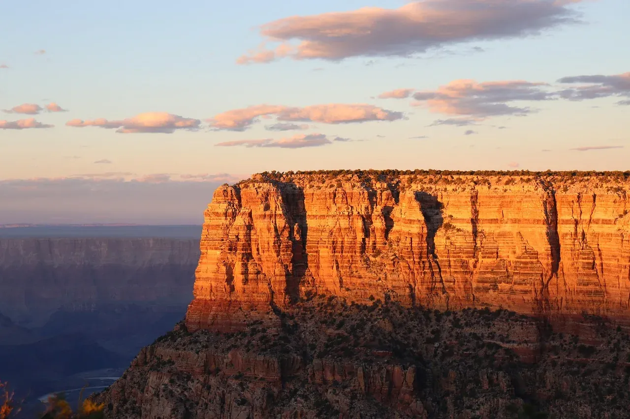 Sunlit cliffs of the Grand Canyon at sunset in Arizona
