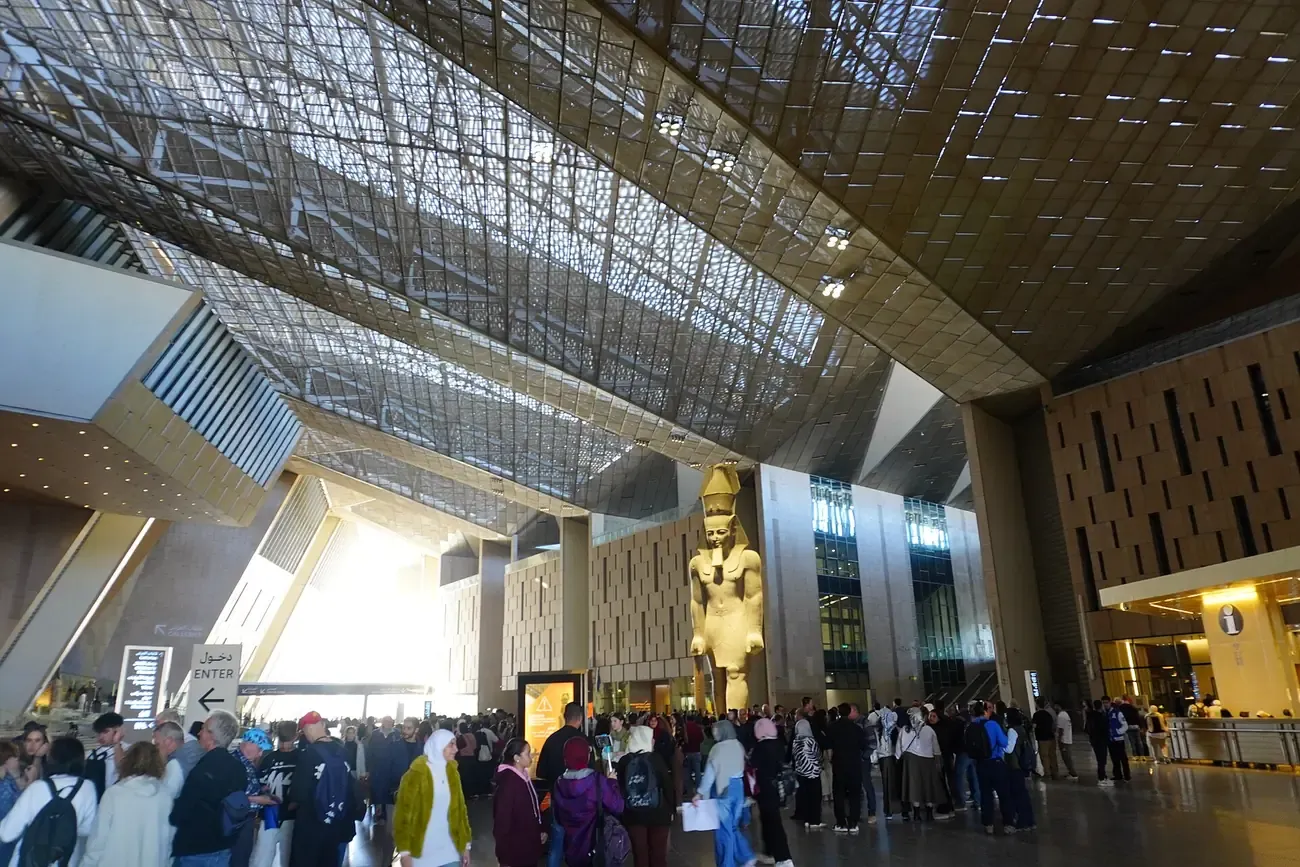 Visitors in the Grand Hall of the Grand Egyptian Museum at Giza