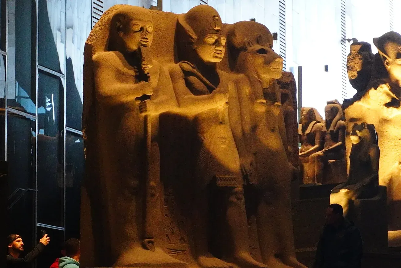 Royal statues lining the Grand Stairs of the Grand Egyptian Museum at Giza