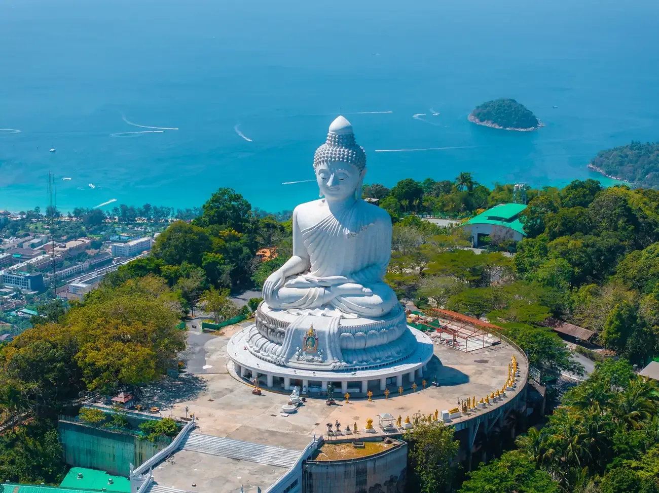 The white marble Great Buddha of Phuket overlooking the coast