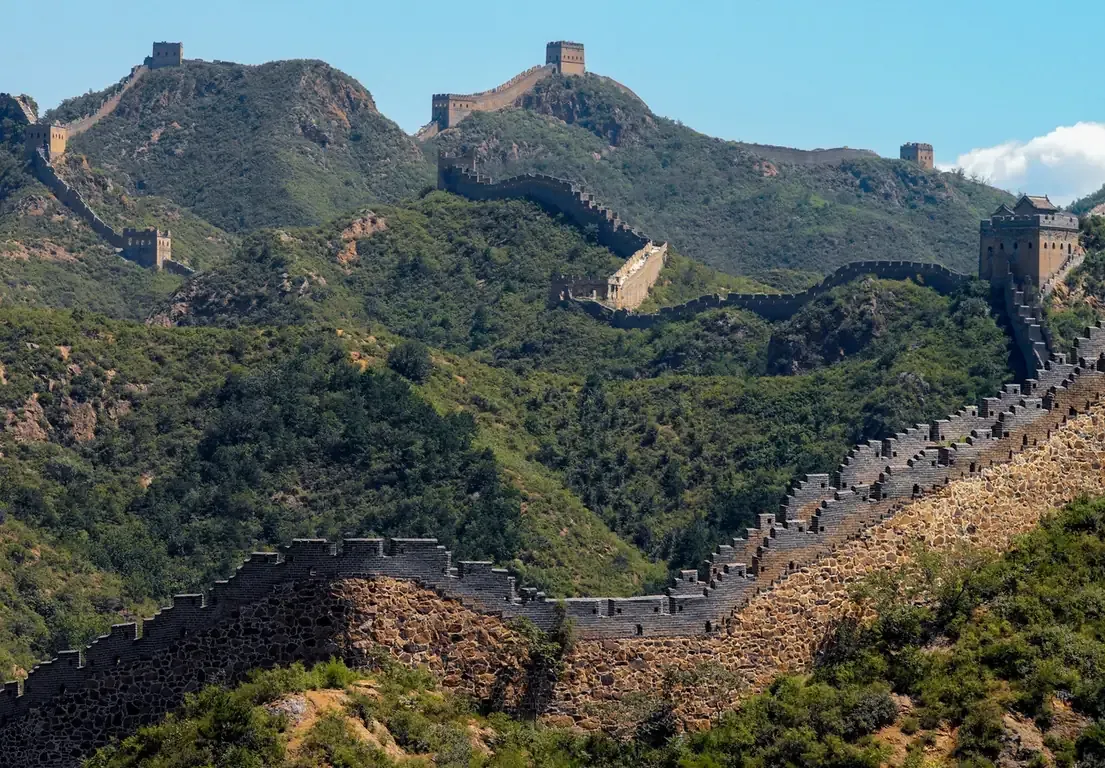 The Great Wall of China winding across mountain ridges