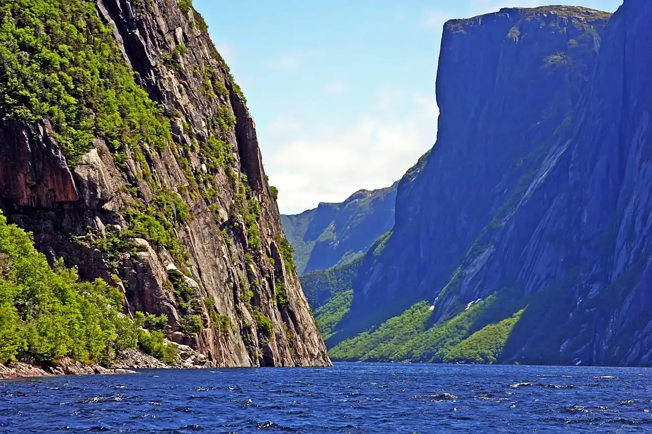 Cliffs above the water of the Western Brook Pond fjord in Gros Morne National Park