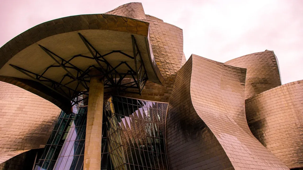 Close view of the curved titanium panels of the Guggenheim Museum Bilbao
