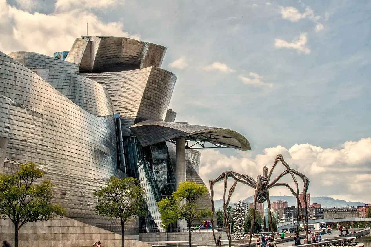 The Guggenheim Museum Bilbao with the Maman spider sculpture outside