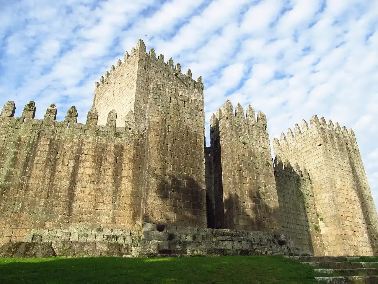 The granite walls and keep of the Castle of Guimaraes in northern Portugal