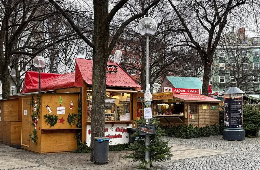 Wooden stalls of the Haidhausen Christmas Market on Weißenburger Platz, Munich