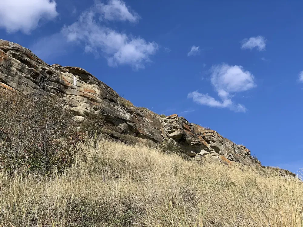 The sandstone cliff of the Head-Smashed-In Buffalo Jump in southern Alberta