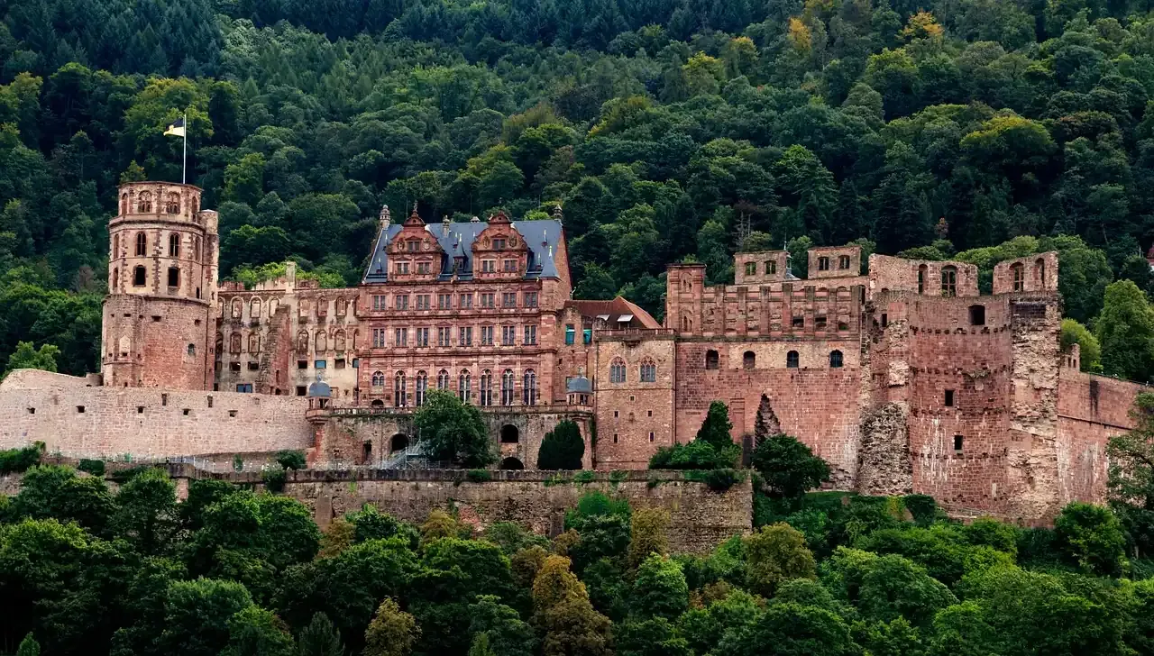 The red sandstone facade of Heidelberg Castle above the terrace