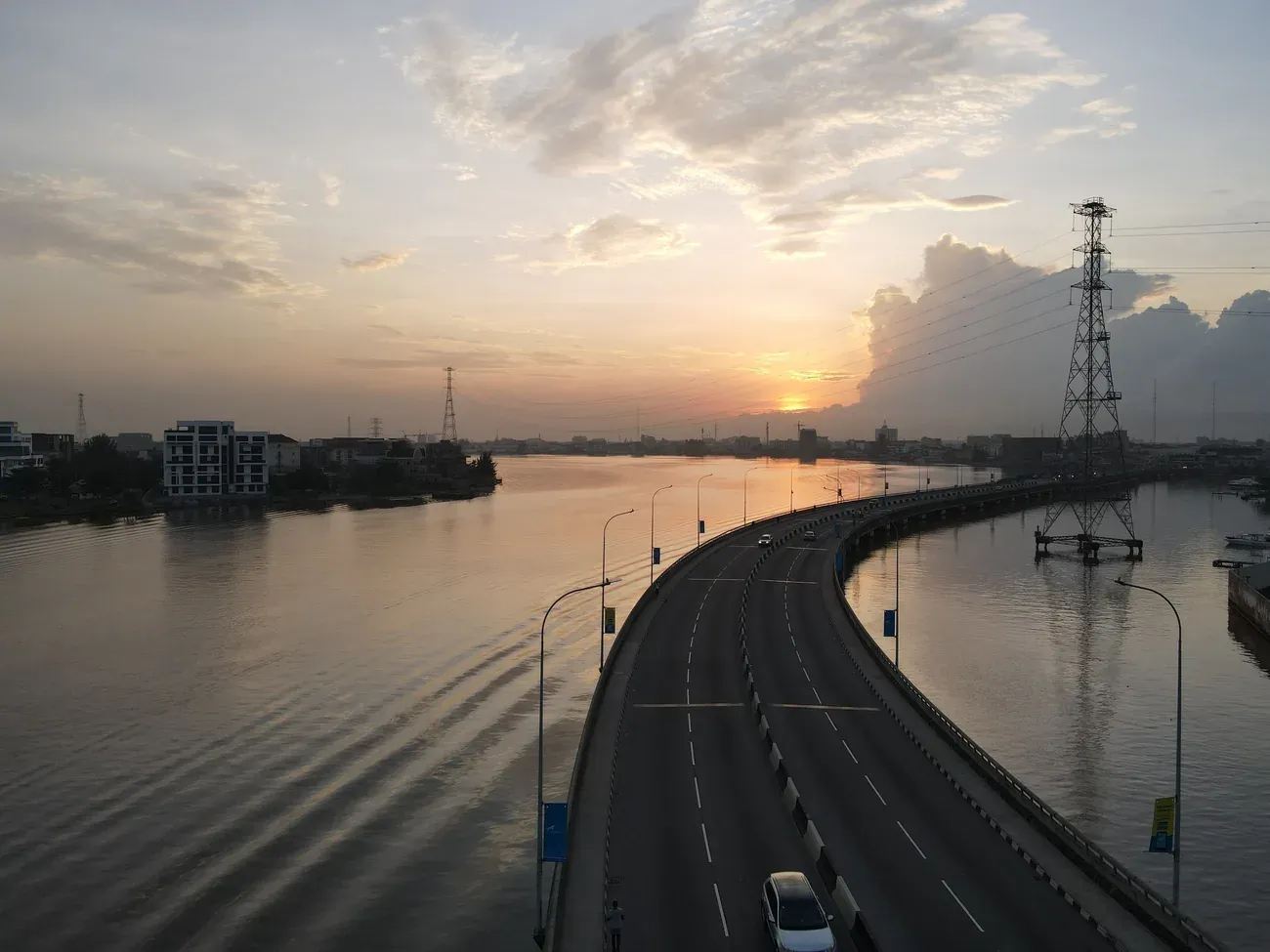 A highway bridge over the lagoon at sunset in Lagos, Nigeria