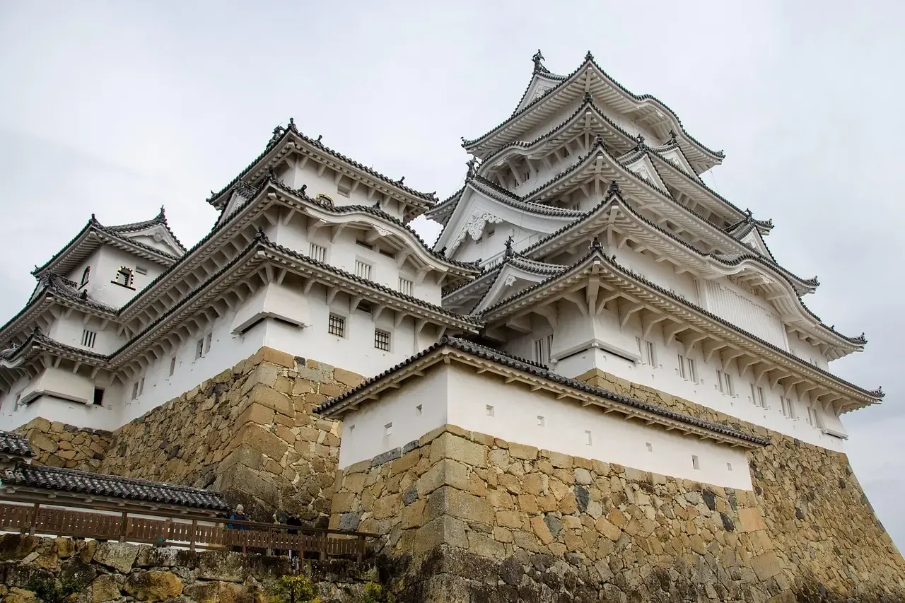 The white plastered walls and layered gables of Himeji Castle in Hyogo prefecture