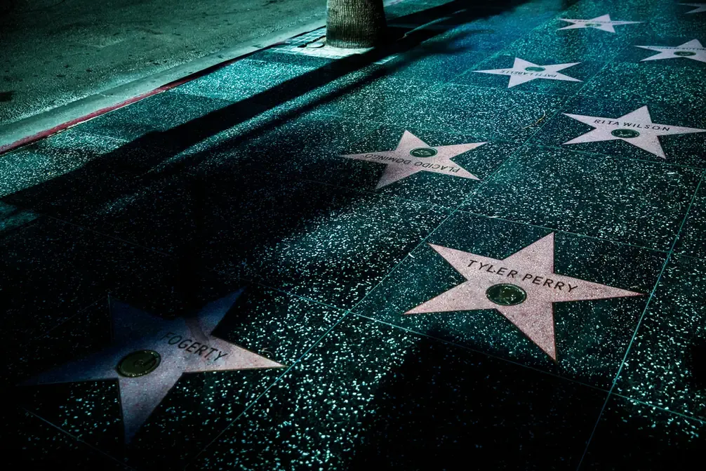 Brass and terrazzo stars set into the sidewalk of the Hollywood Walk of Fame in Los Angeles