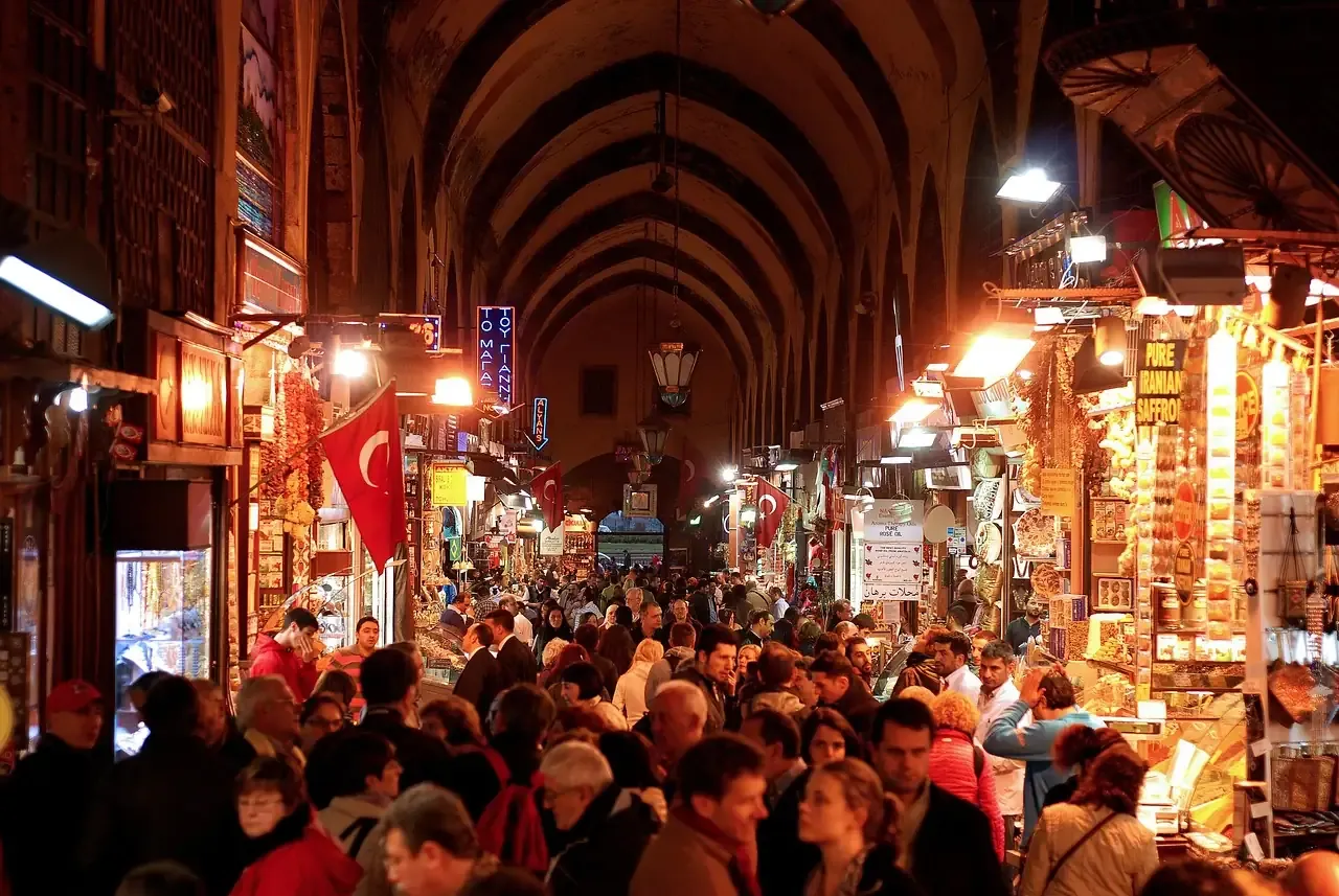 Shoppers under the painted vaults of the Grand Bazaar in Istanbul