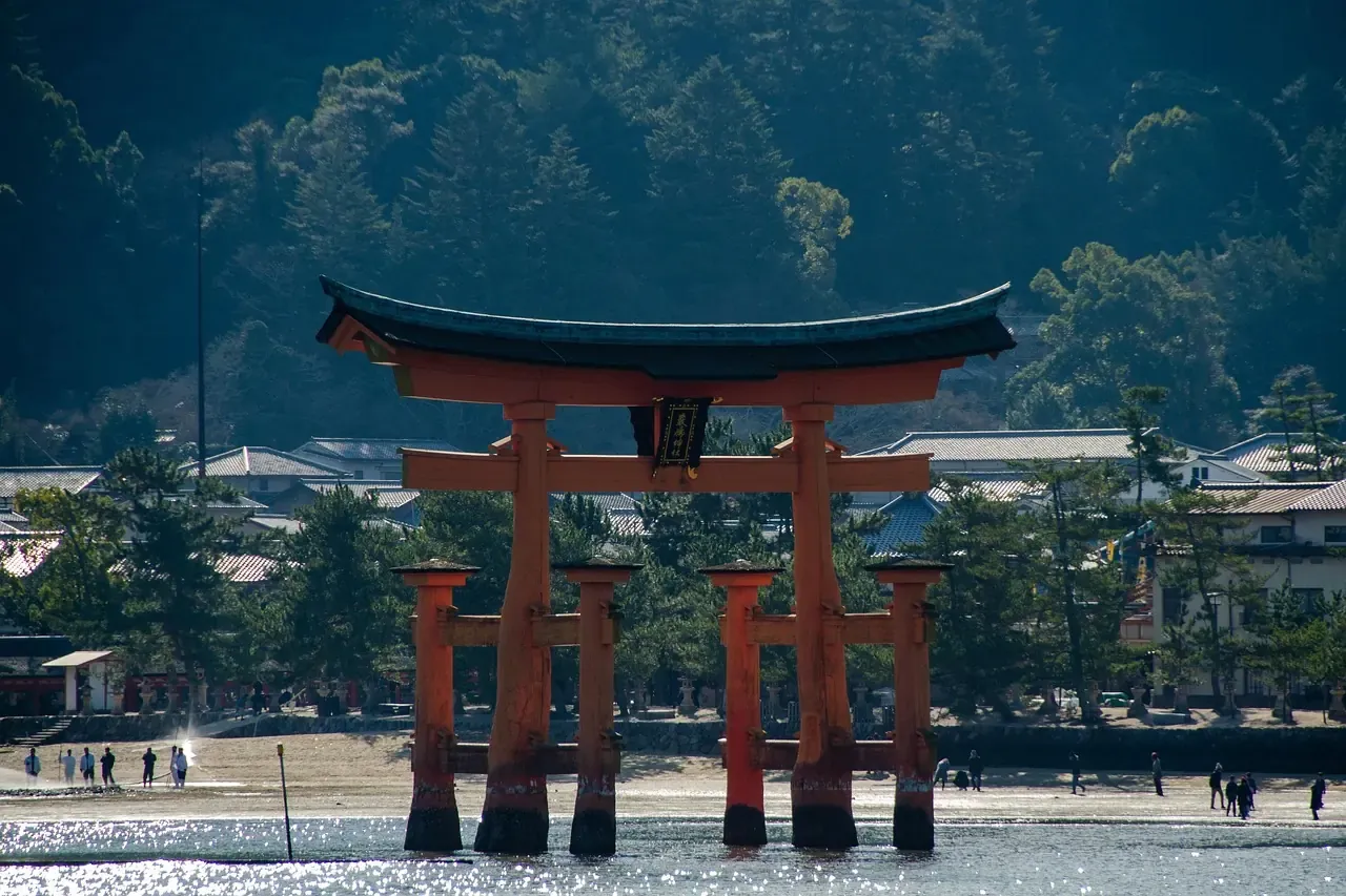 The torii of Itsukushima Shrine reachable on foot at low tide at Miyajima