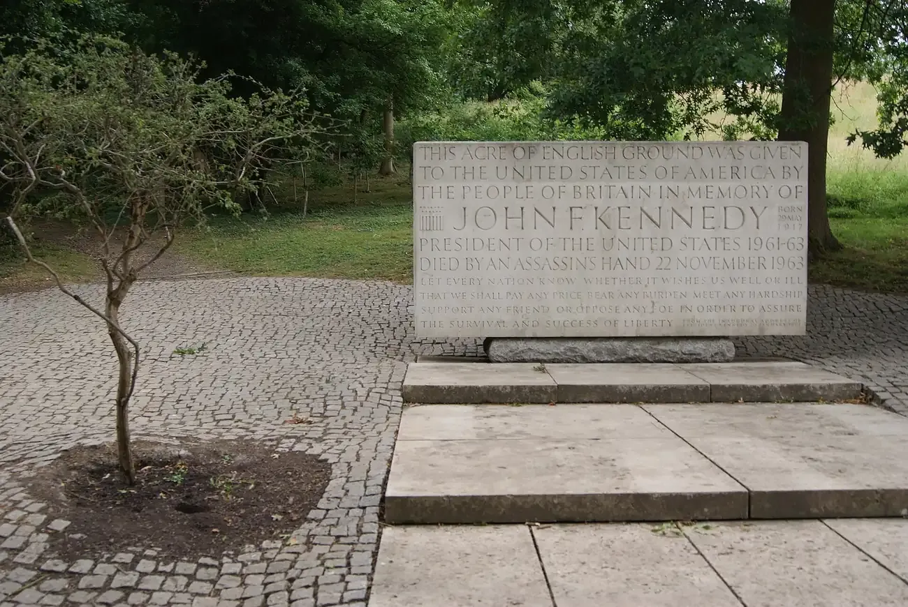 The John F. Kennedy Memorial stone in its clearing at Runnymede in Surrey