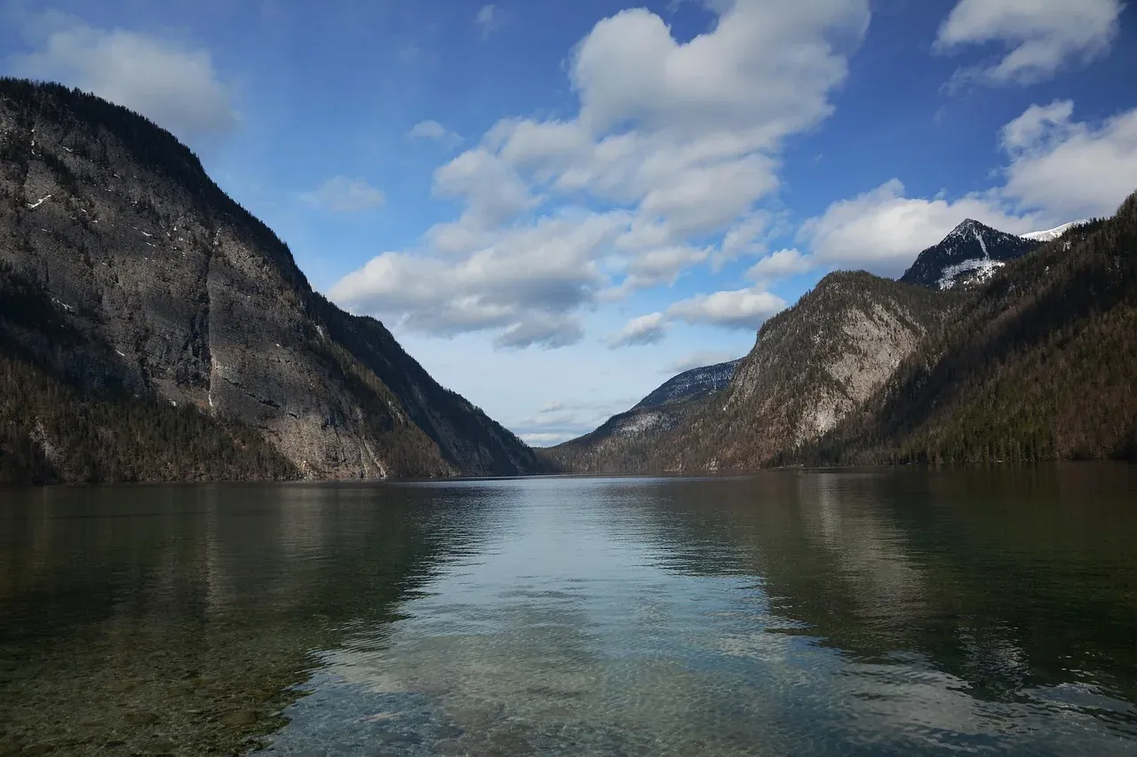 The Koenigssee reaching between the steep walls of the Berchtesgaden Alps