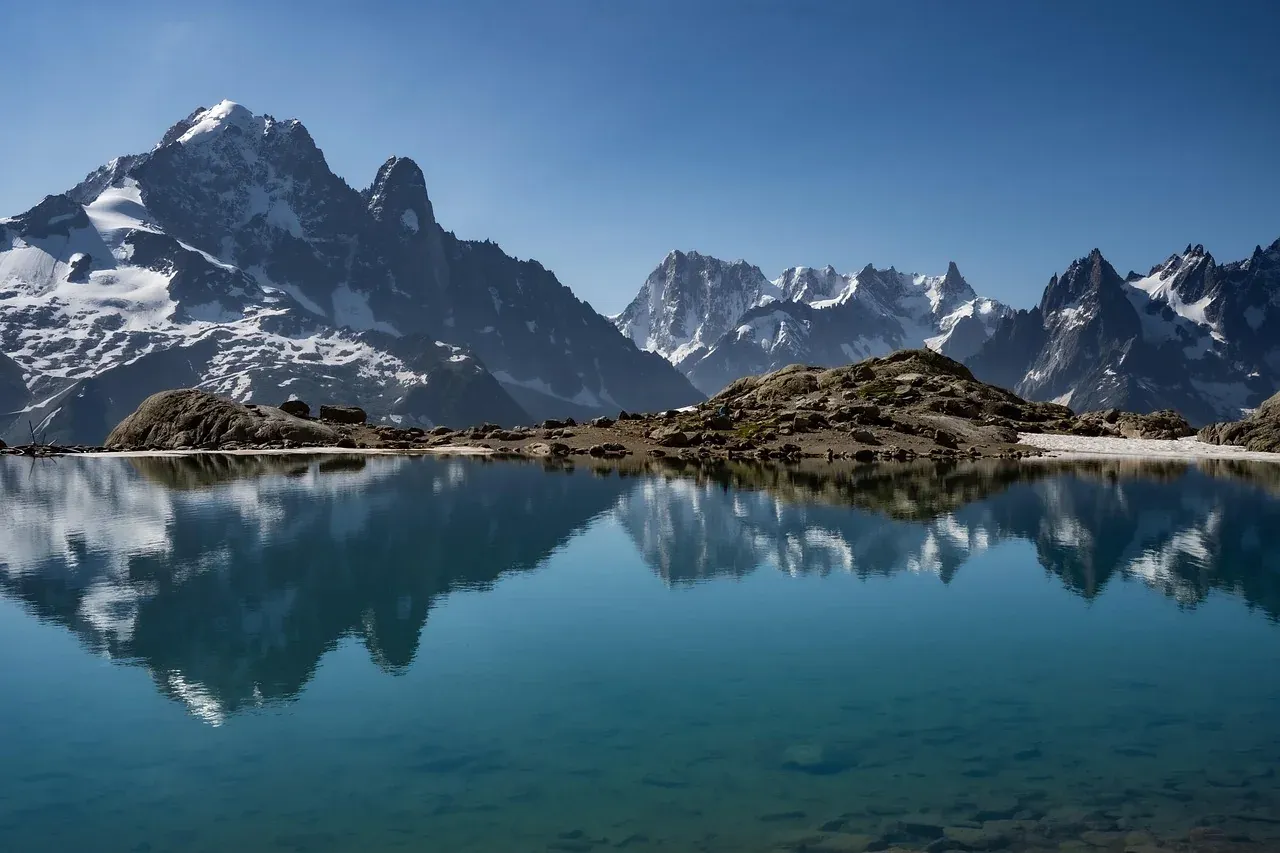 The Mont Blanc massif reflected in Lac Blanc above Chamonix, French Alps