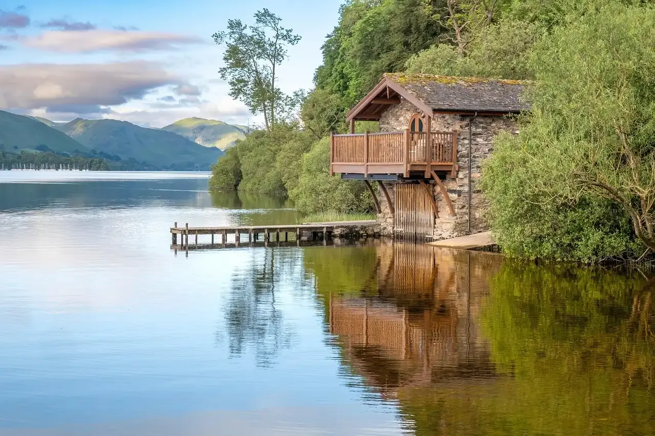 A timber boathouse on the shore of Ullswater in the Lake District, Cumbria