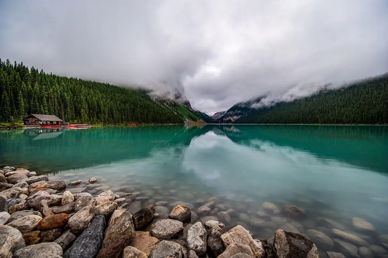 The shoreline of Lake Louise below its mountain cirque, Alberta