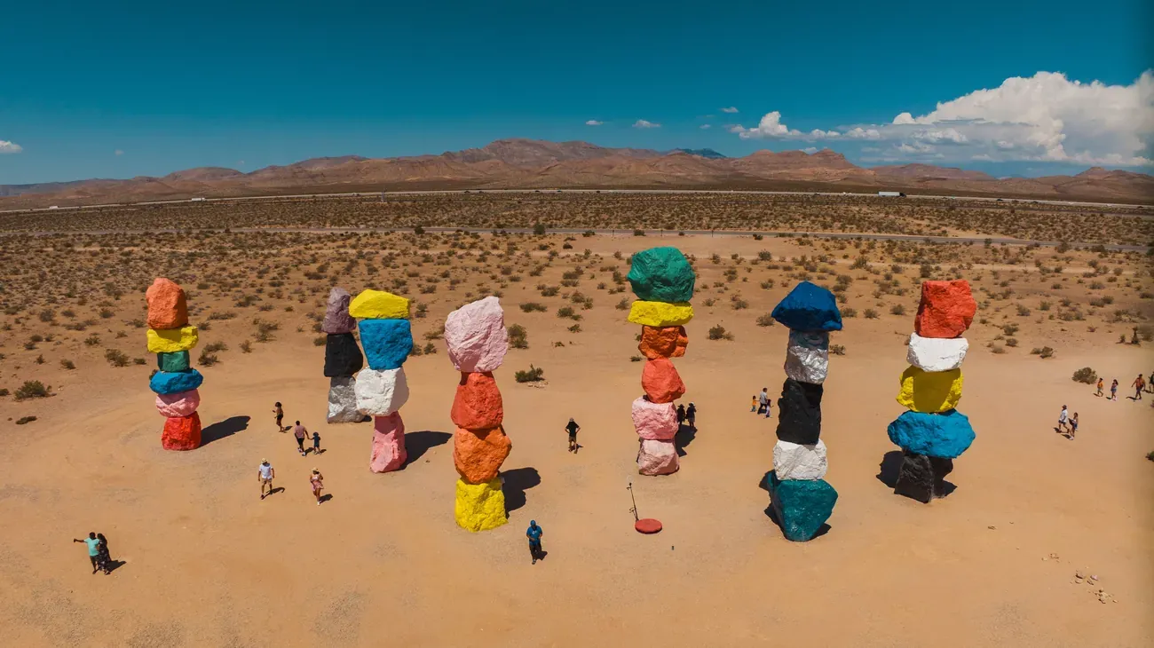 The colourful stacked-boulder sculptures of Seven Magic Mountains near Las Vegas