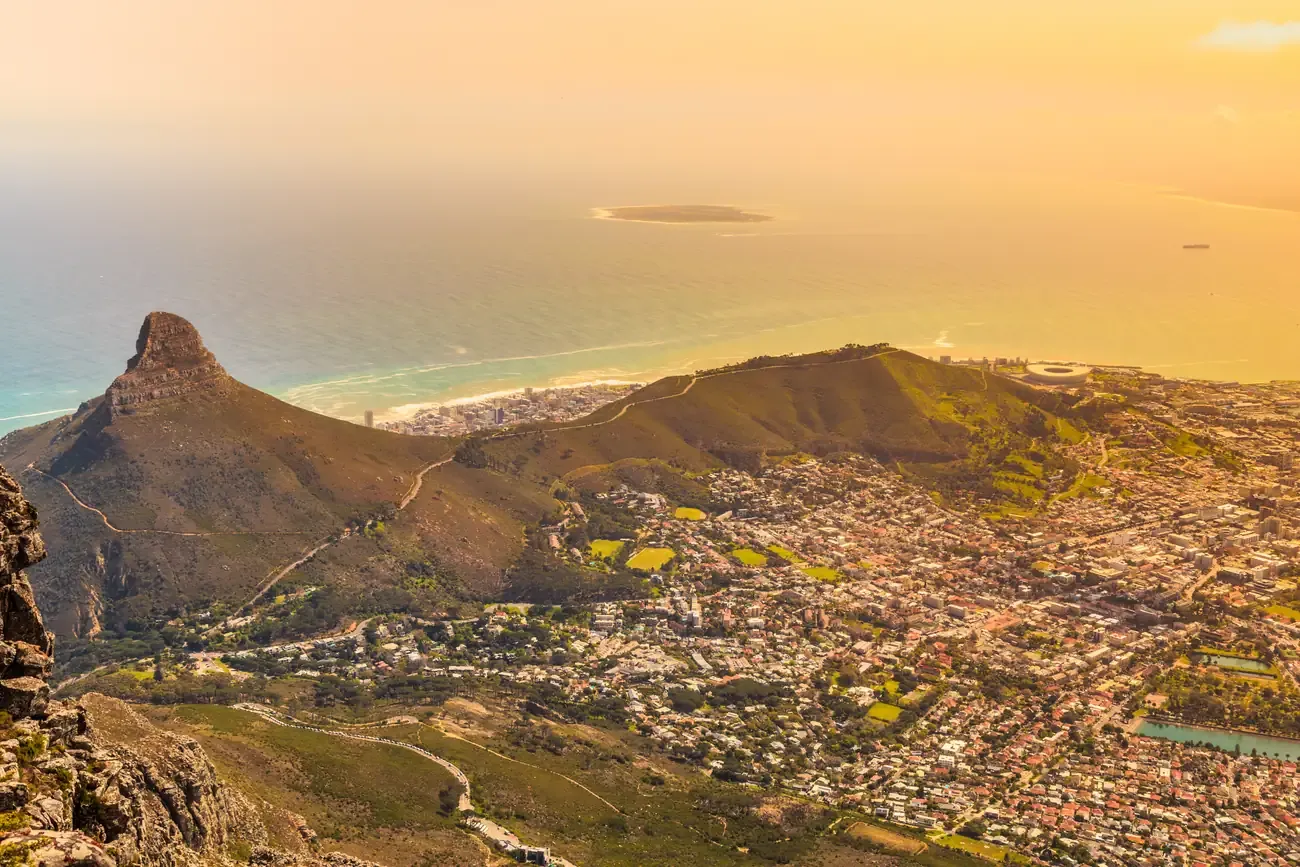 Aerial view of Lion's Head and Signal Hill over Cape Town at sunset