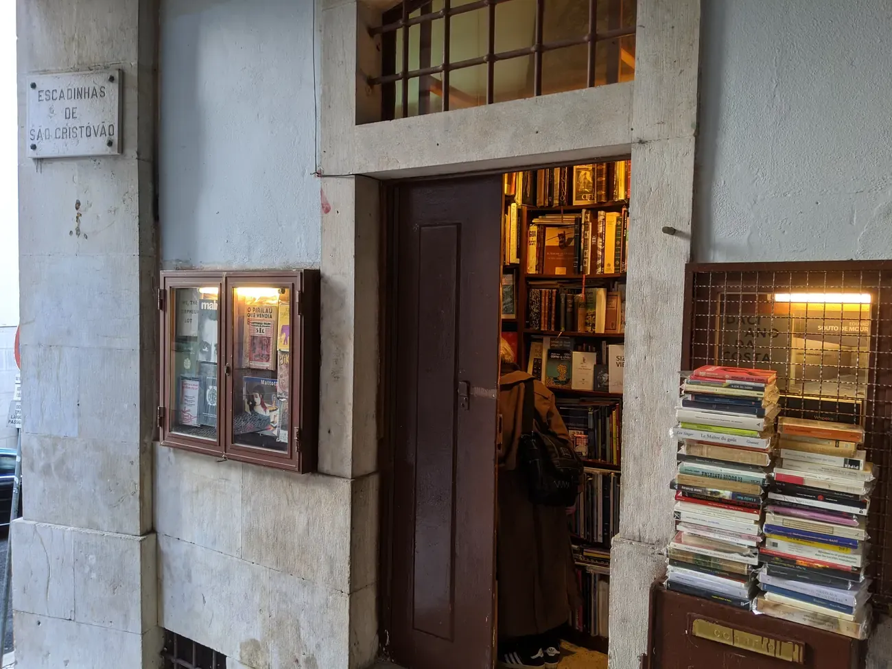The book-crammed doorway of the tiny Livraria Simao bookshop on the Escadinhas de Sao Cristovao stairway in Lisbon